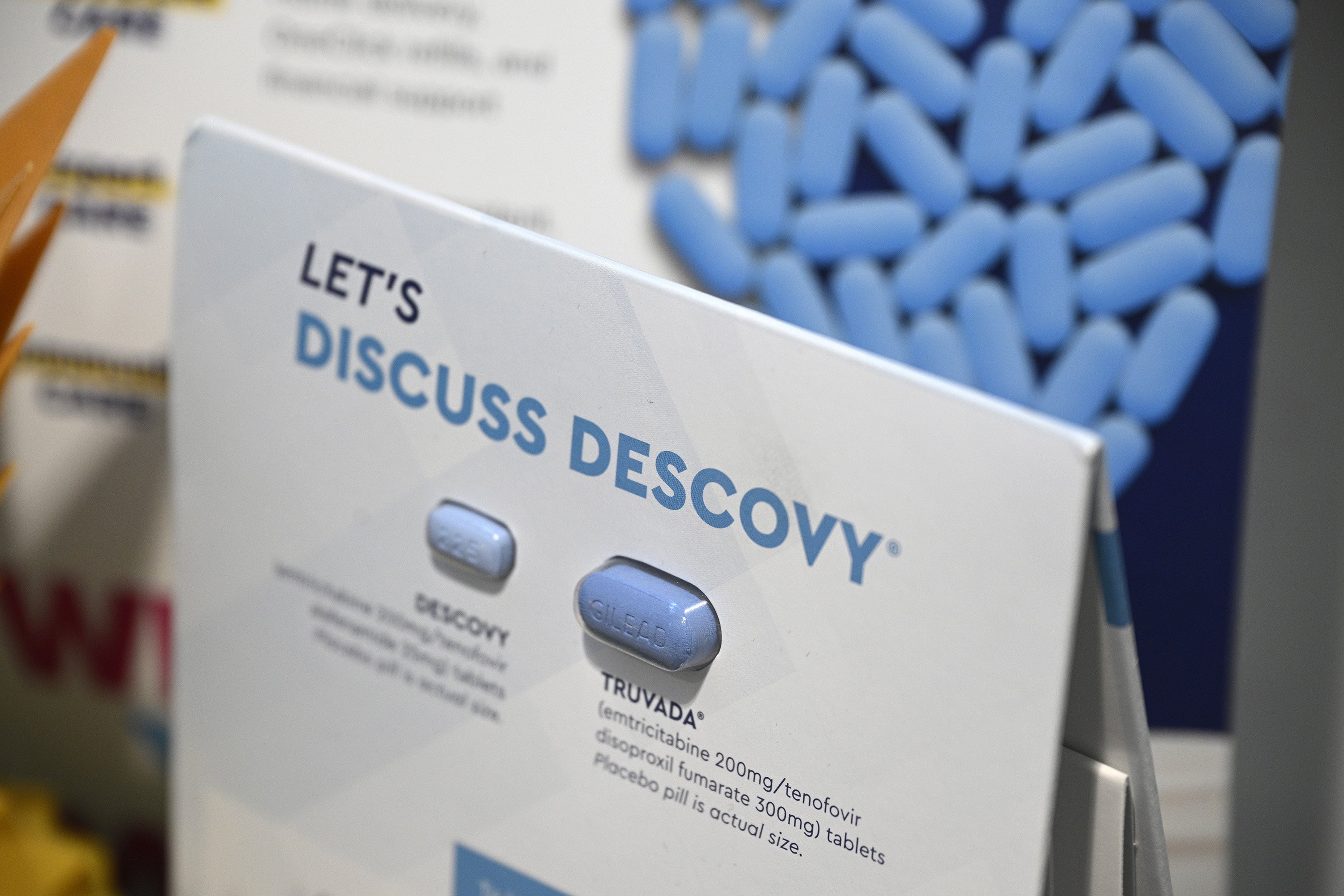 Information about HIV medications is displayed in the waiting area...